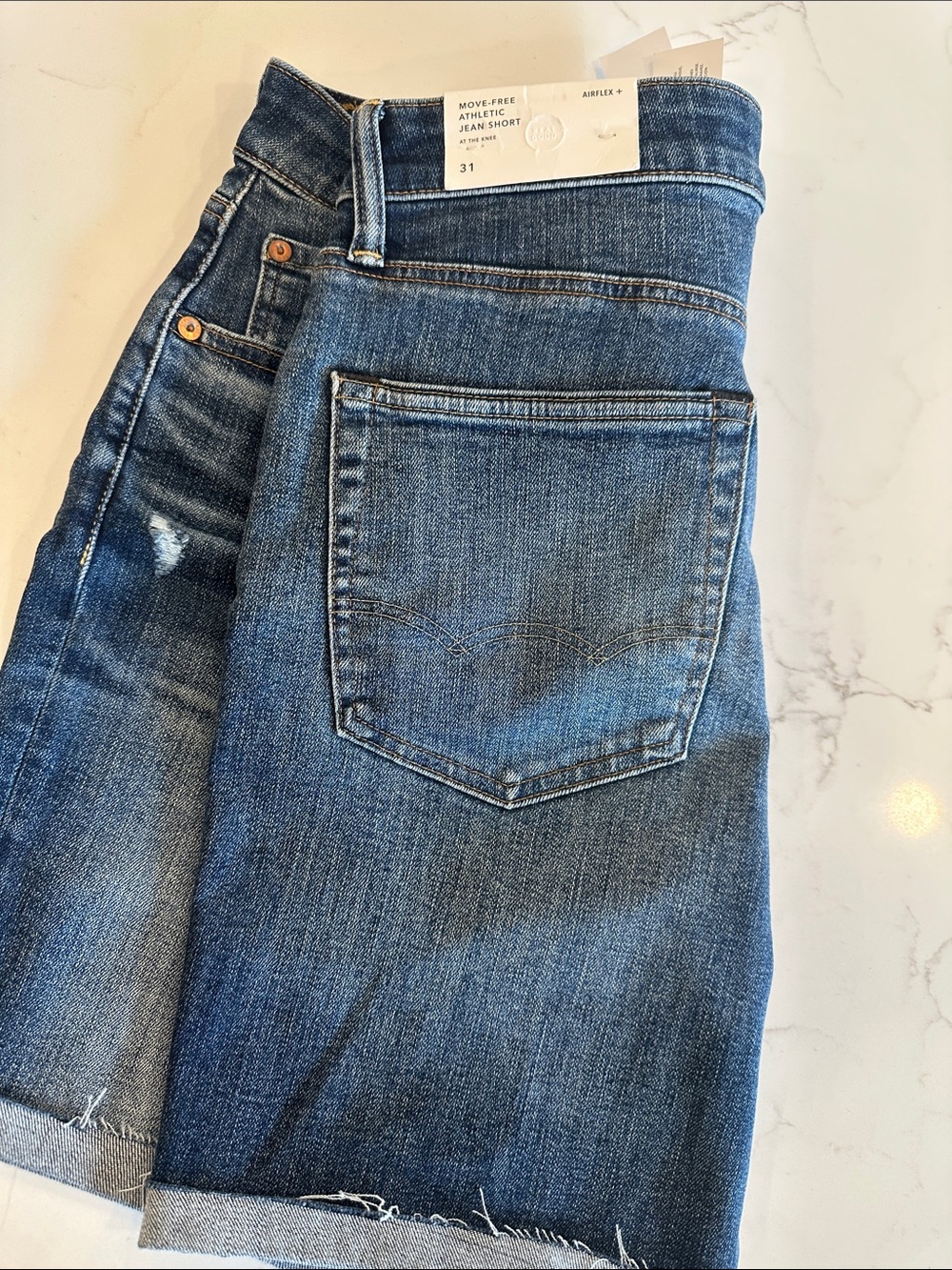 American Eagle Athletic Jean Short in Medium Blue Denim